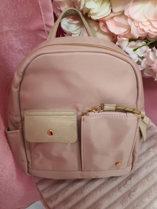 Mochila bolsillos rosa