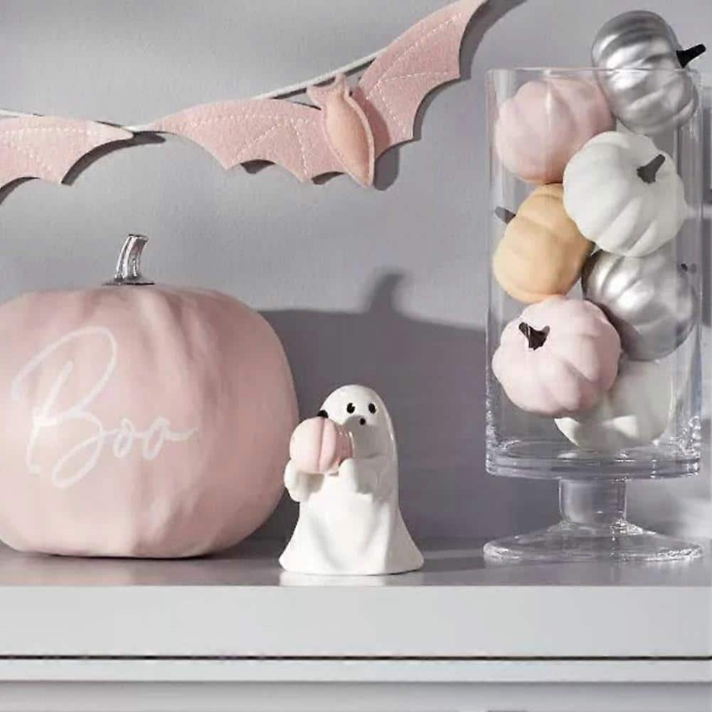 Figura fantasma con calabaza rosa - Imagen 2
