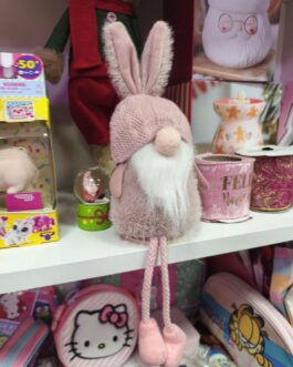 Gnomo disfrazado de conejo rosa