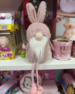 Gnomo disfrazado de conejo rosa