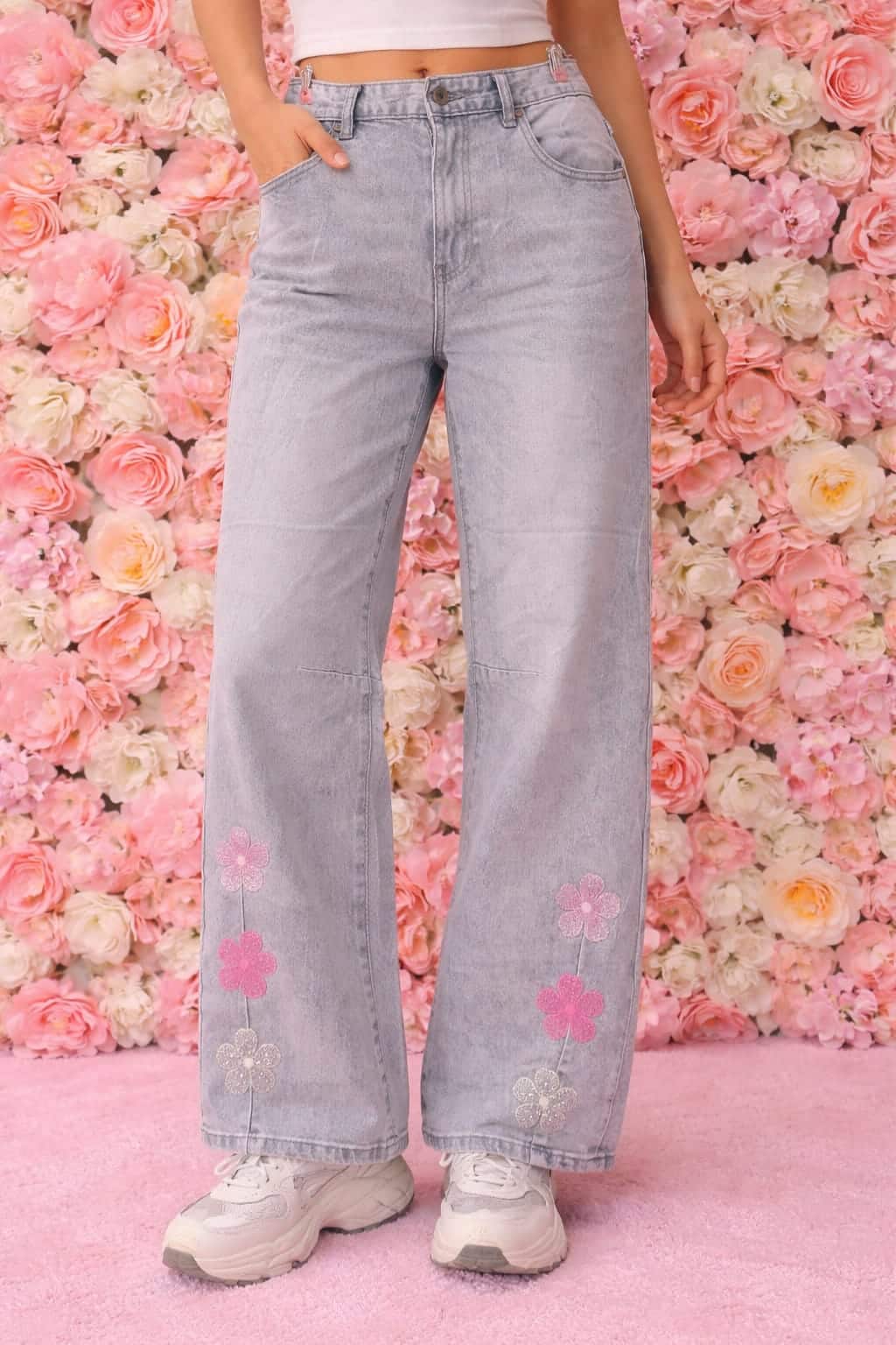 Vaqueros flores purpurina