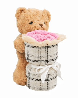 Oso peluche con ramo de rosas