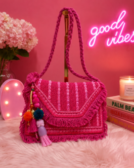 Bolso fucsia flecos y lentejuelas