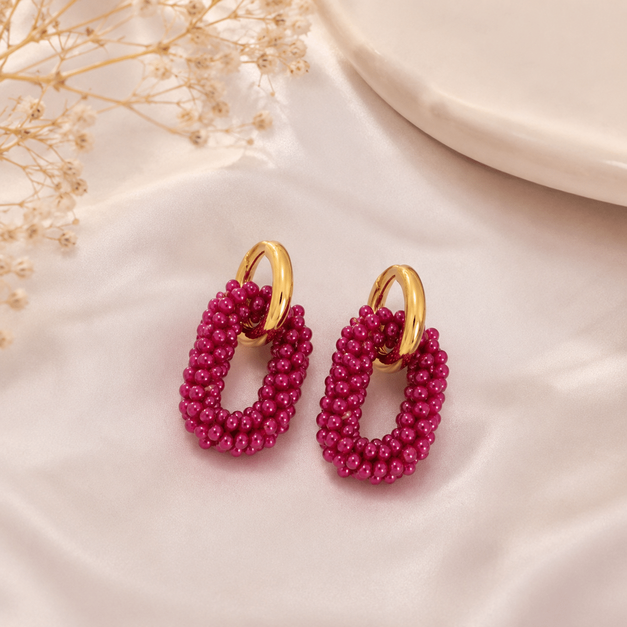 Pendientes aros de cuentas fucsias