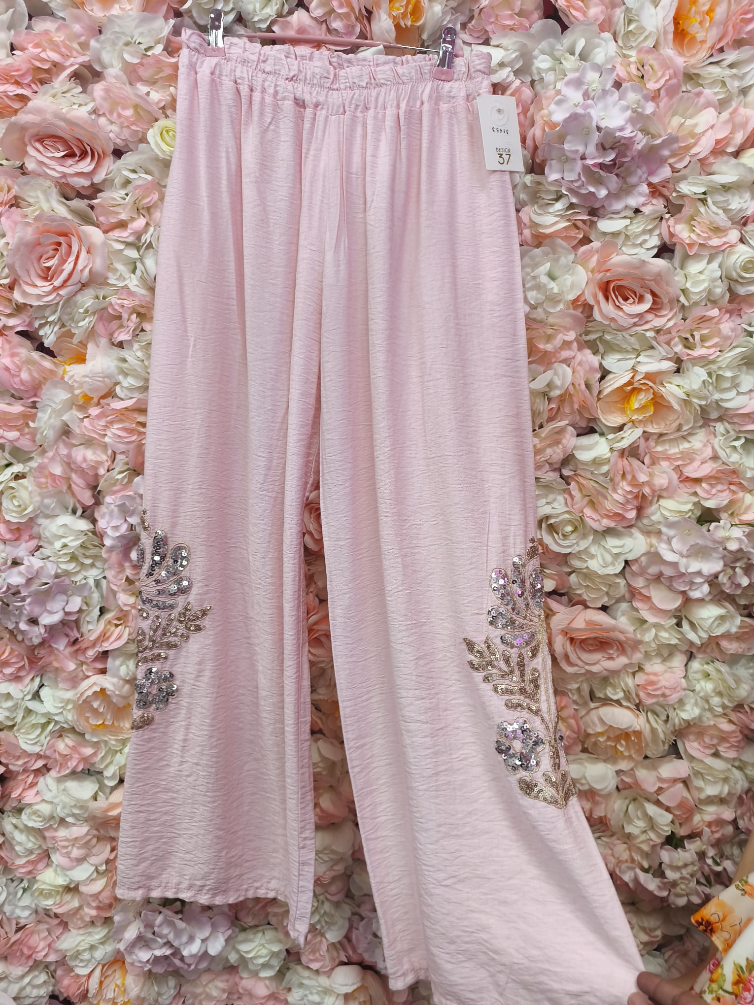 Pantalón floral con lentejuelas - Imagen 2