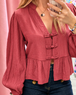 Blusa romántica con lazadas